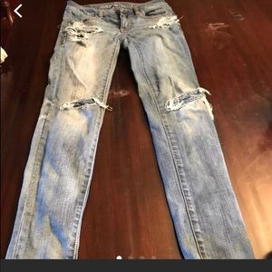 4 pairs of American Eagle Jeans